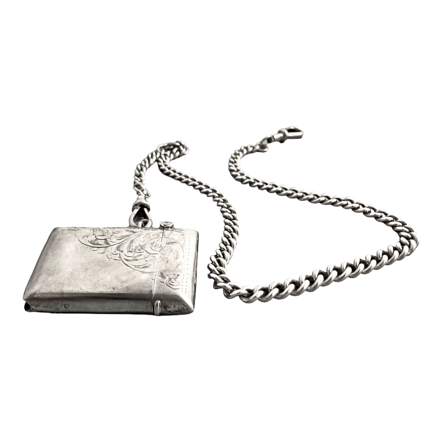 WWI sterling silver vesta case engraved with scrolls, on a Victorian watch curb Albert chain