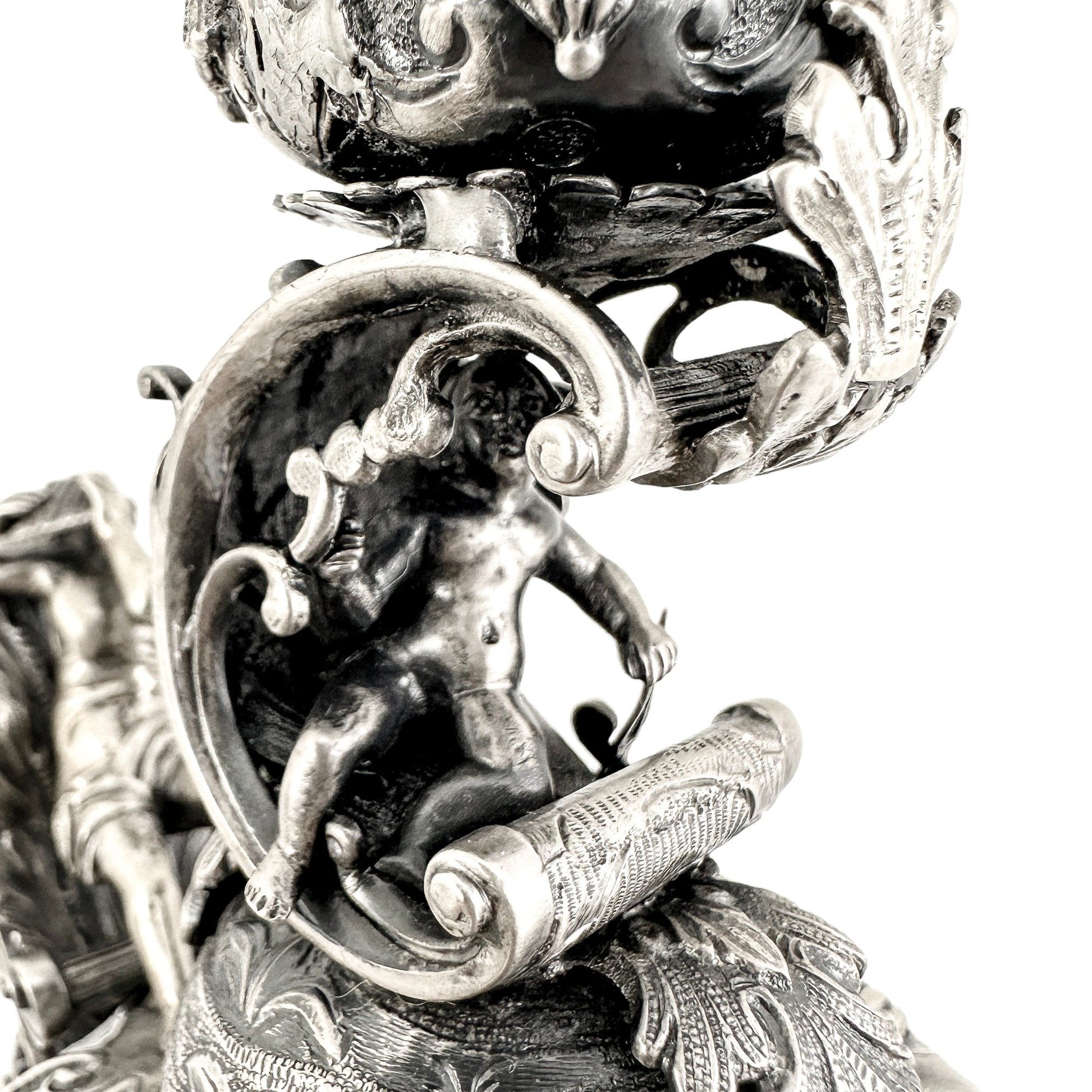 Renaissance Revival Hanau pair of large figural candlesticks with Pan and cherubs