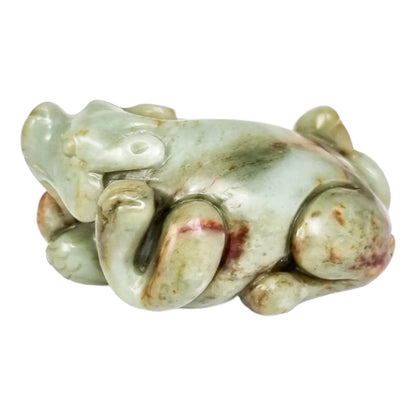 Qing dynasty celadon russet jade carving of lion and bird