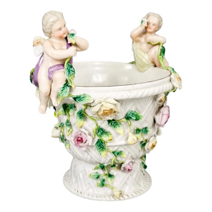 19th century German porcelain basket weave vase with rose garlands and cherubs