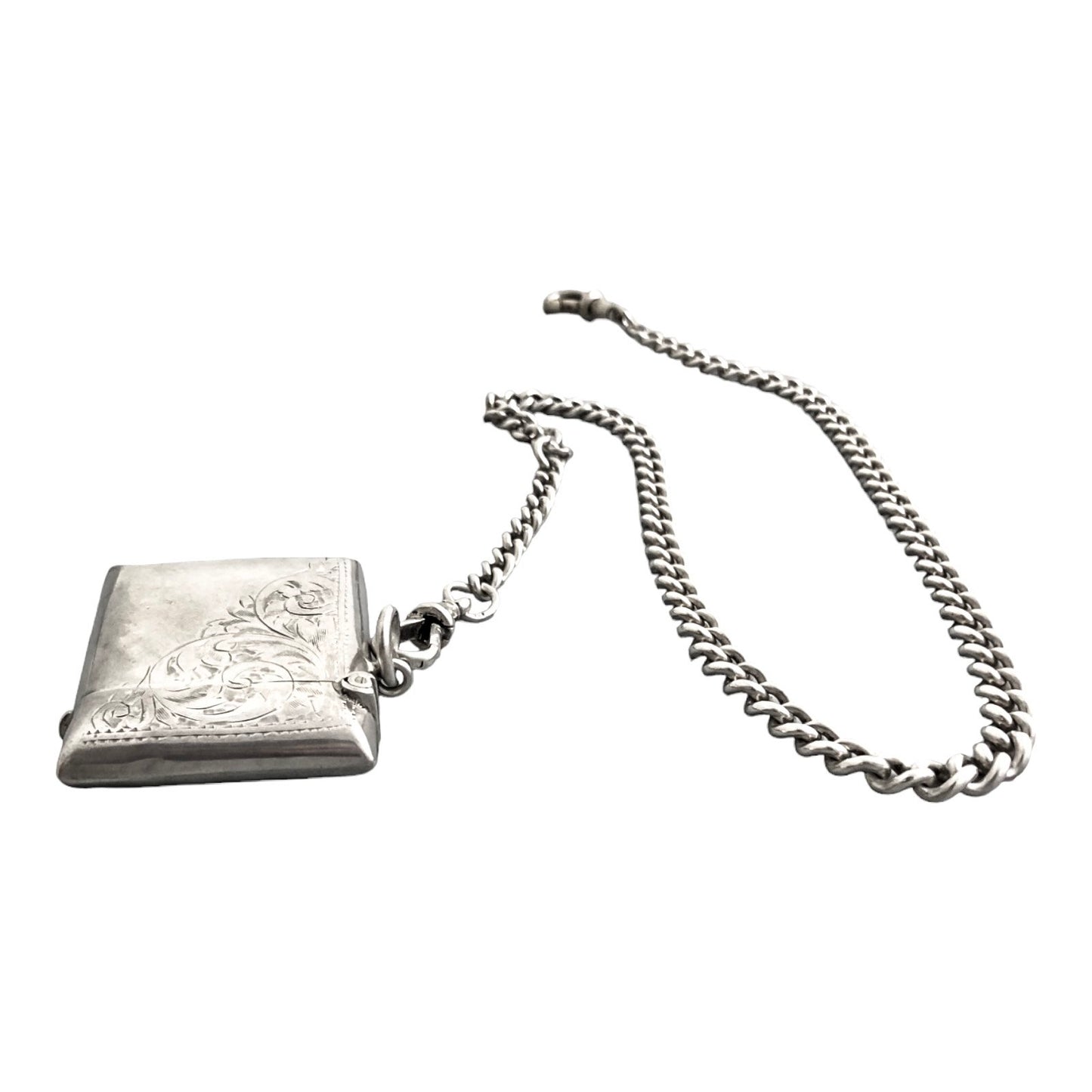 WWI sterling silver vesta case engraved with scrolls, on a Victorian watch curb Albert chain