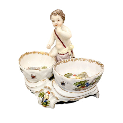 19th century Dresden porcelain open salt cellar with seated putti