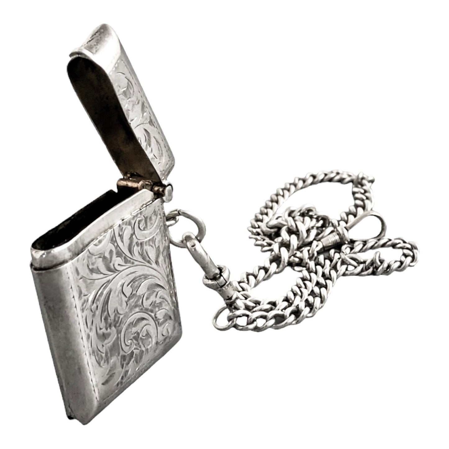 WWI sterling silver vesta case engraved with scrolls, on a Victorian watch curb Albert chain