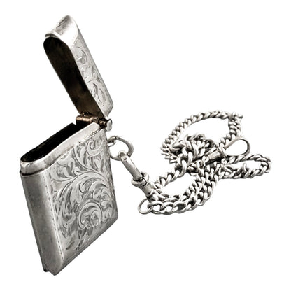 WWI sterling silver vesta case engraved with scrolls, on a Victorian watch curb Albert chain
