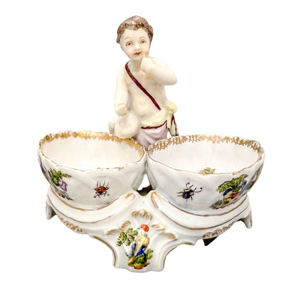 19th century Dresden porcelain open salt cellar with seated putti