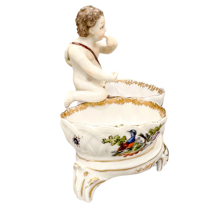 19th century Dresden porcelain open salt cellar with seated putti