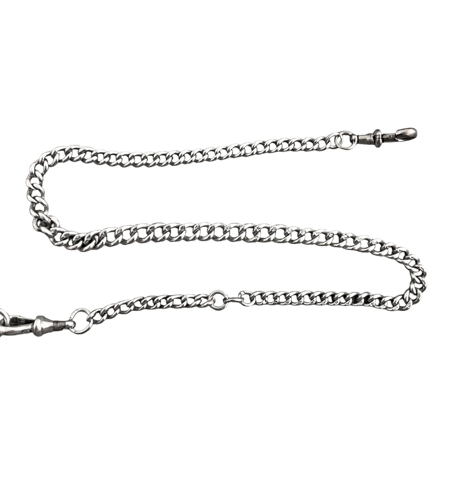 WWI sterling silver vesta case engraved with scrolls, on a Victorian watch curb Albert chain