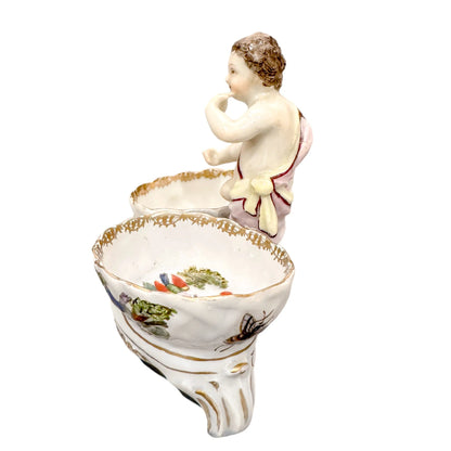 19th century Dresden porcelain open salt cellar with seated putti