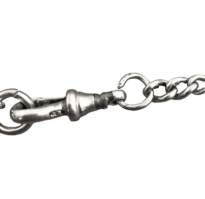 WWI sterling silver vesta case engraved with scrolls, on a Victorian watch curb Albert chain