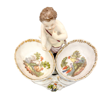 19th century Dresden porcelain open salt cellar with seated putti