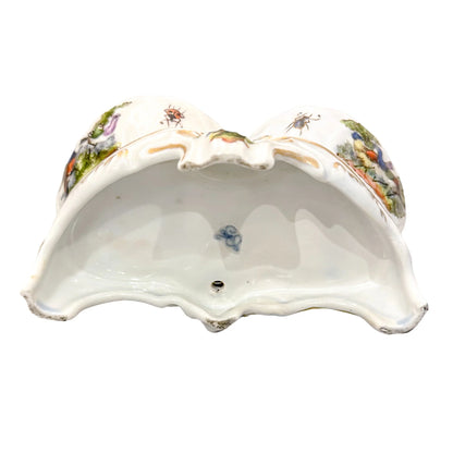 19th century Dresden porcelain open salt cellar with seated putti