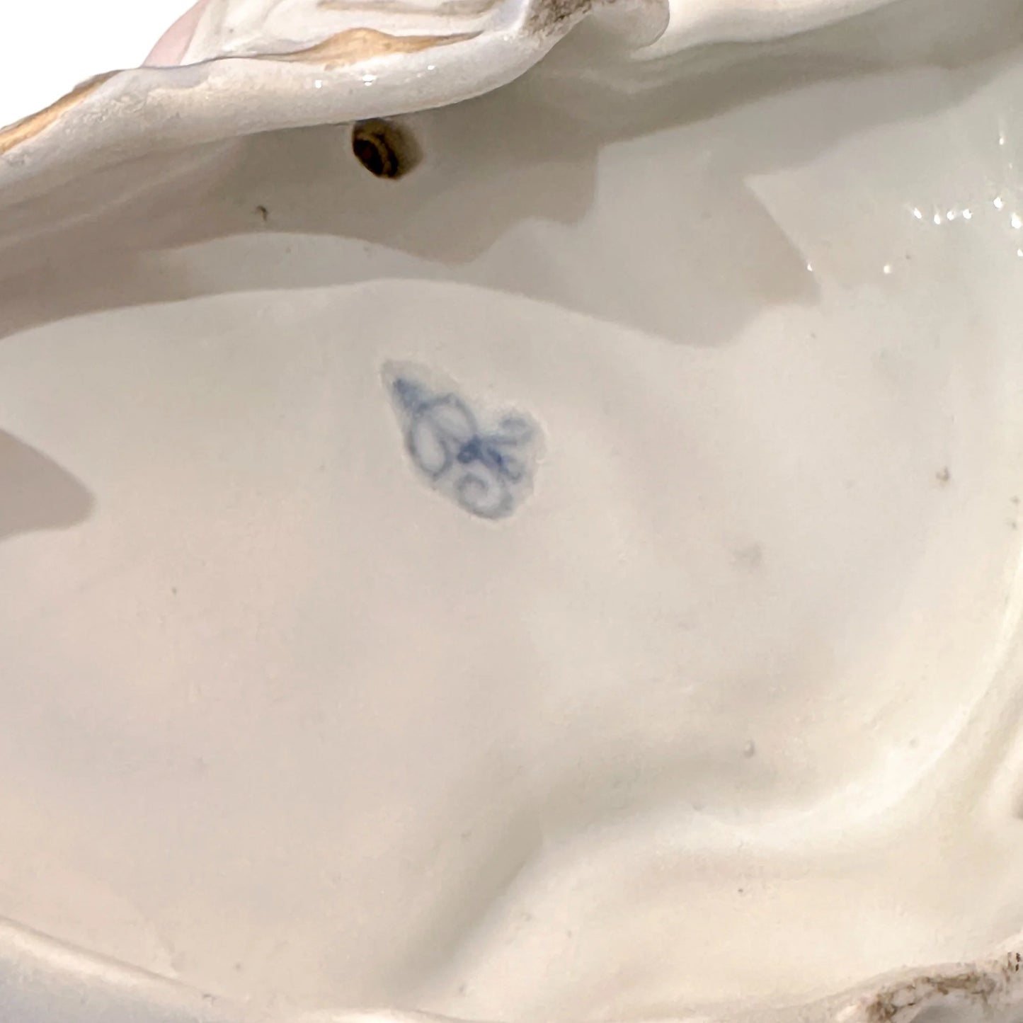 19th century Dresden porcelain open salt cellar with seated putti