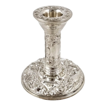 Vintage sterling silver candlestick embossed with flowers in Art Nouveau style