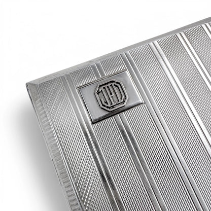 Large gilt sterling silver WWII cigarette case with engine-turned design