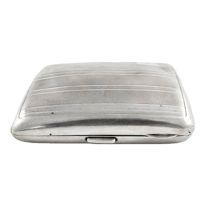 Art Deco gilt and sterling silver cigarette card case inscribed “Clive”