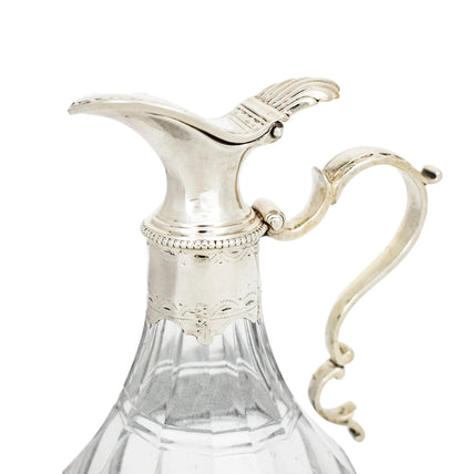 George III silver mounted cut-glass oil / vinegar jug with griffin armorial