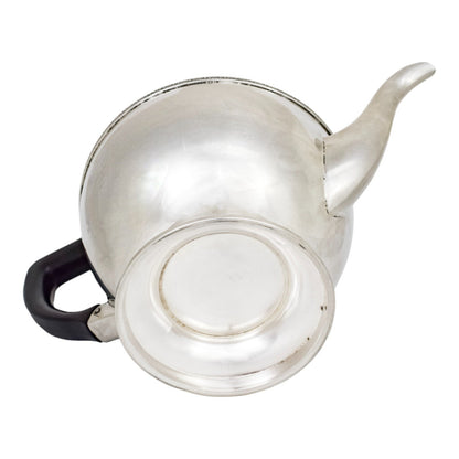 Three piece Art Deco sterling tea set with bow garlands and geometric handles