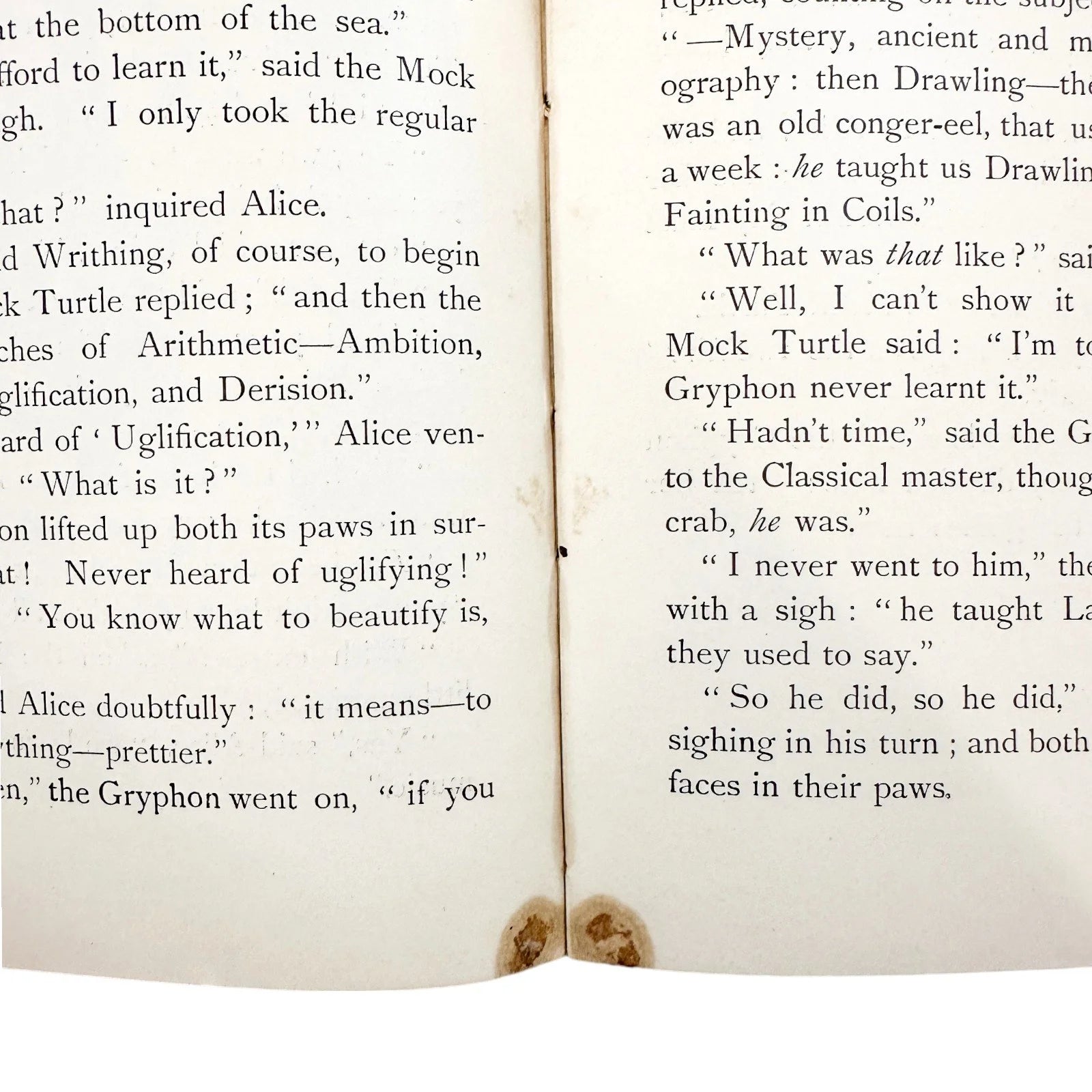 Illustrated leather bound first edition thus of "Alice's Adventures in Wonderland"