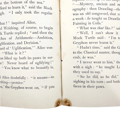 Illustrated leather bound first edition thus of "Alice's Adventures in Wonderland"
