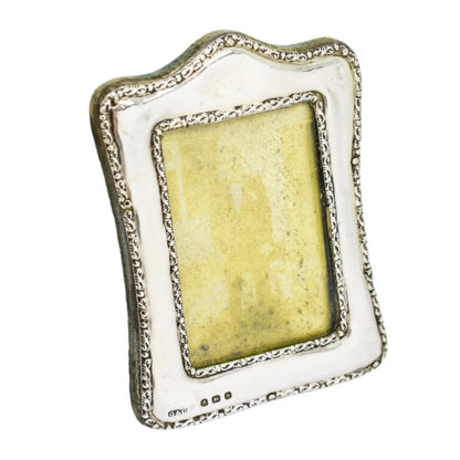 Edwardian sterling silver easel photo frame trimmed with scrolls