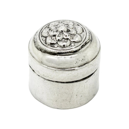 Middle Eastern silver round pill box with lotus flower lid