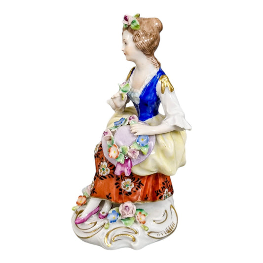 Sitzendorf porcelain figurine young girl with flower hat on tree stump