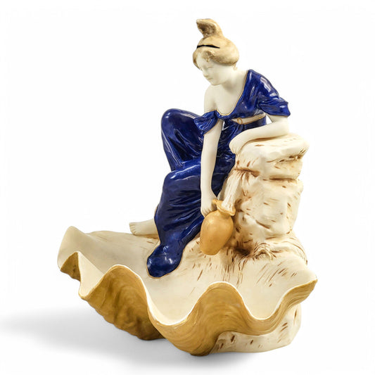 Royal Dux Bohemia Art Nouveau porcelain centrepiece with water bearer and giant clam shell, Czechoslovakia, circa 1920s