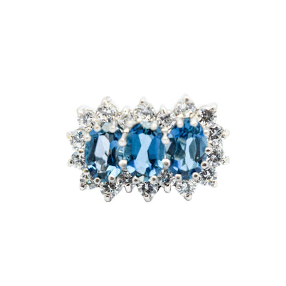 Vintage 1980's three-stone blue topaz cluster ring, 9ct yellow gold, size K 1/2