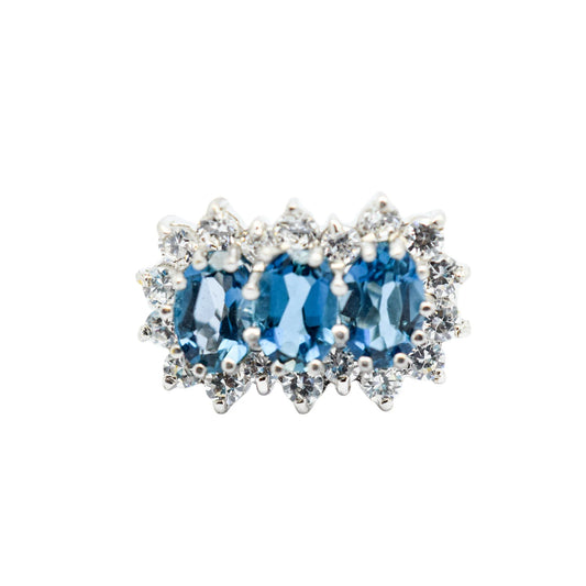Vintage 1980's three-stone blue topaz cluster ring, 9ct yellow gold, size K 1/2