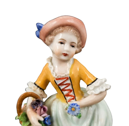 Sitzendorf porcelain pair of figurines of a flower girl and her cavalier
