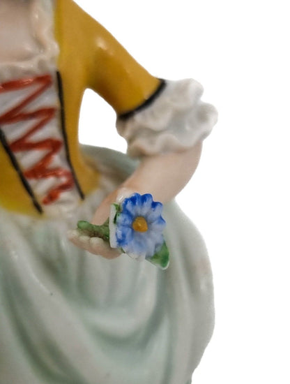 Sitzendorf porcelain pair of figurines of a flower girl and her cavalier