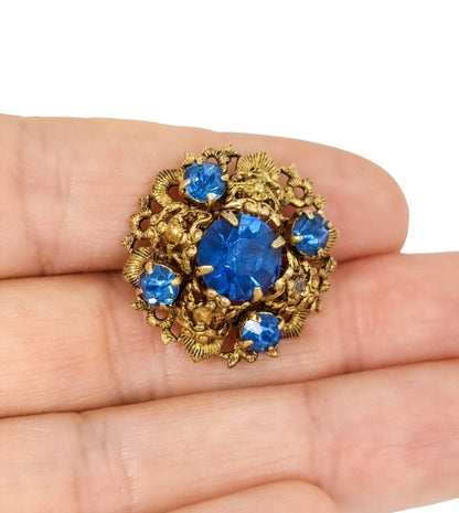 1960’s small Czechoslovakian blue glass gilt filigree brooch