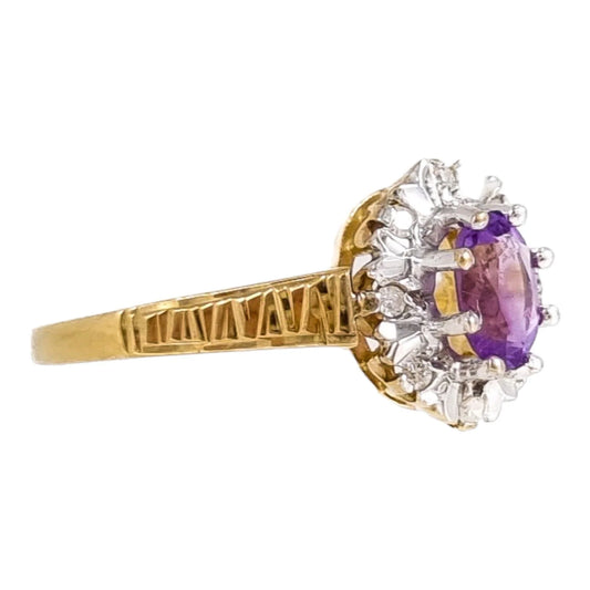 Elegant vintage diamond and amethyst floral ring set in a 9 ct yellow gold band, size N