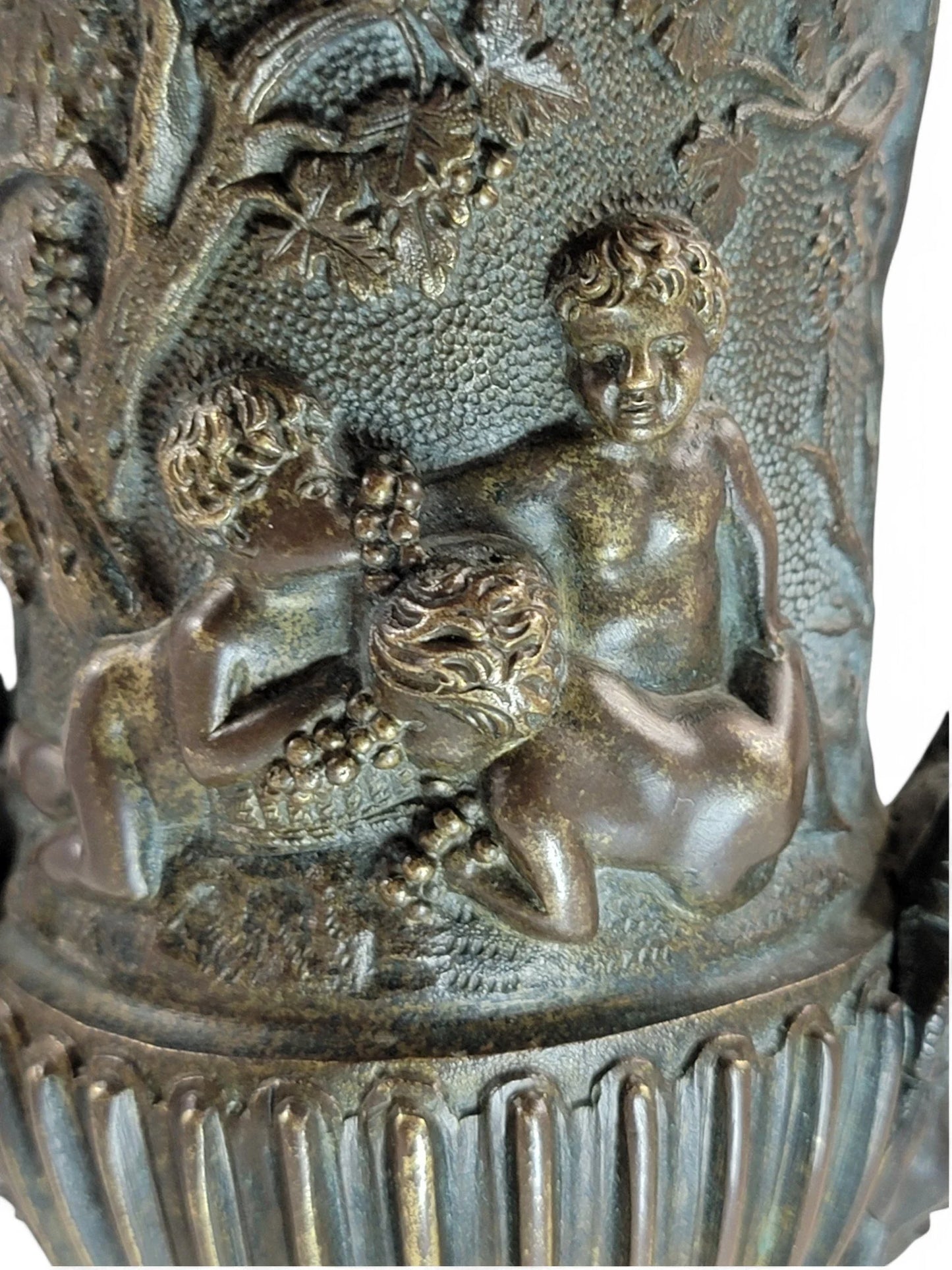 Italian Art Nouveau hand cast bronze amphora with children and grapevine design
