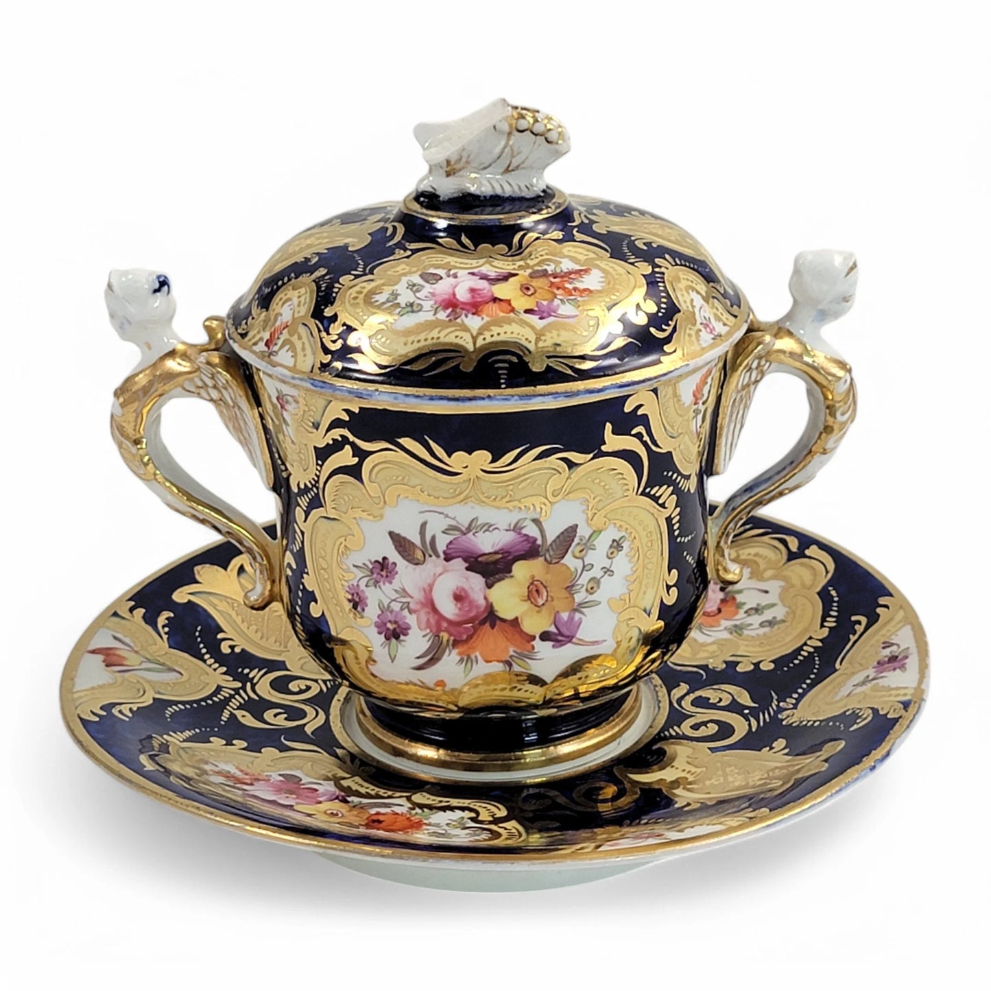 Regency era Coalport Pembroke chocolate cup and caucer, winged harpy handles