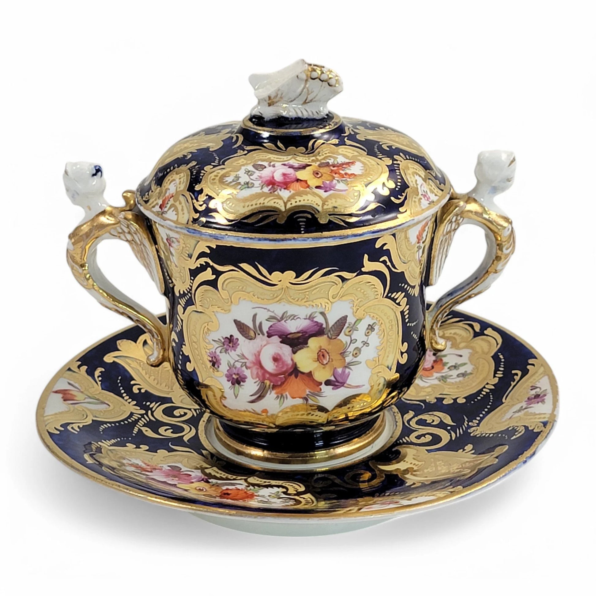 Regency era Coalport Pembroke chocolate cup and caucer, winged harpy handles