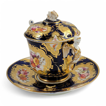 Regency era Coalport Pembroke chocolate cup and caucer, winged harpy handles