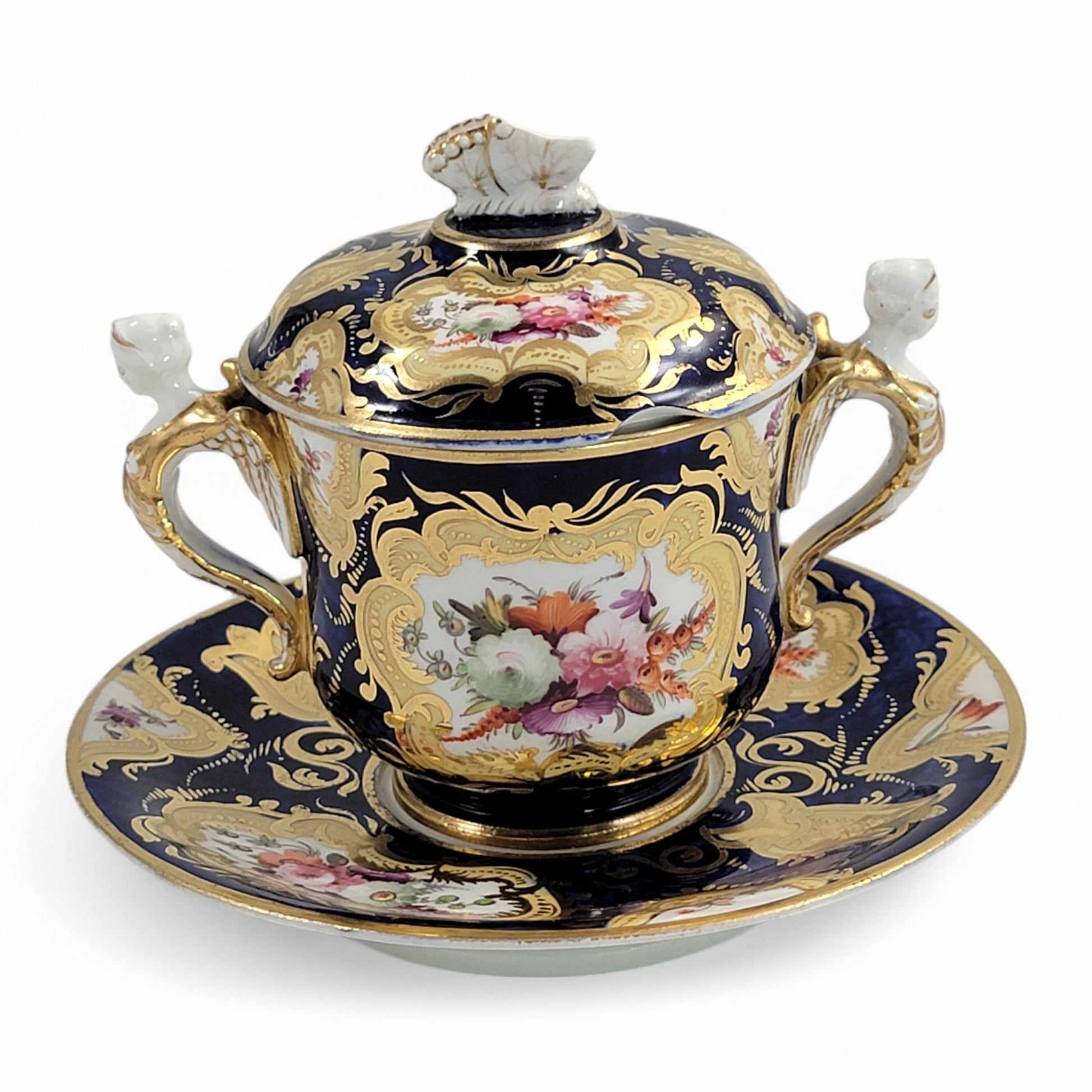 Regency era Coalport Pembroke chocolate cup and caucer, winged harpy handles