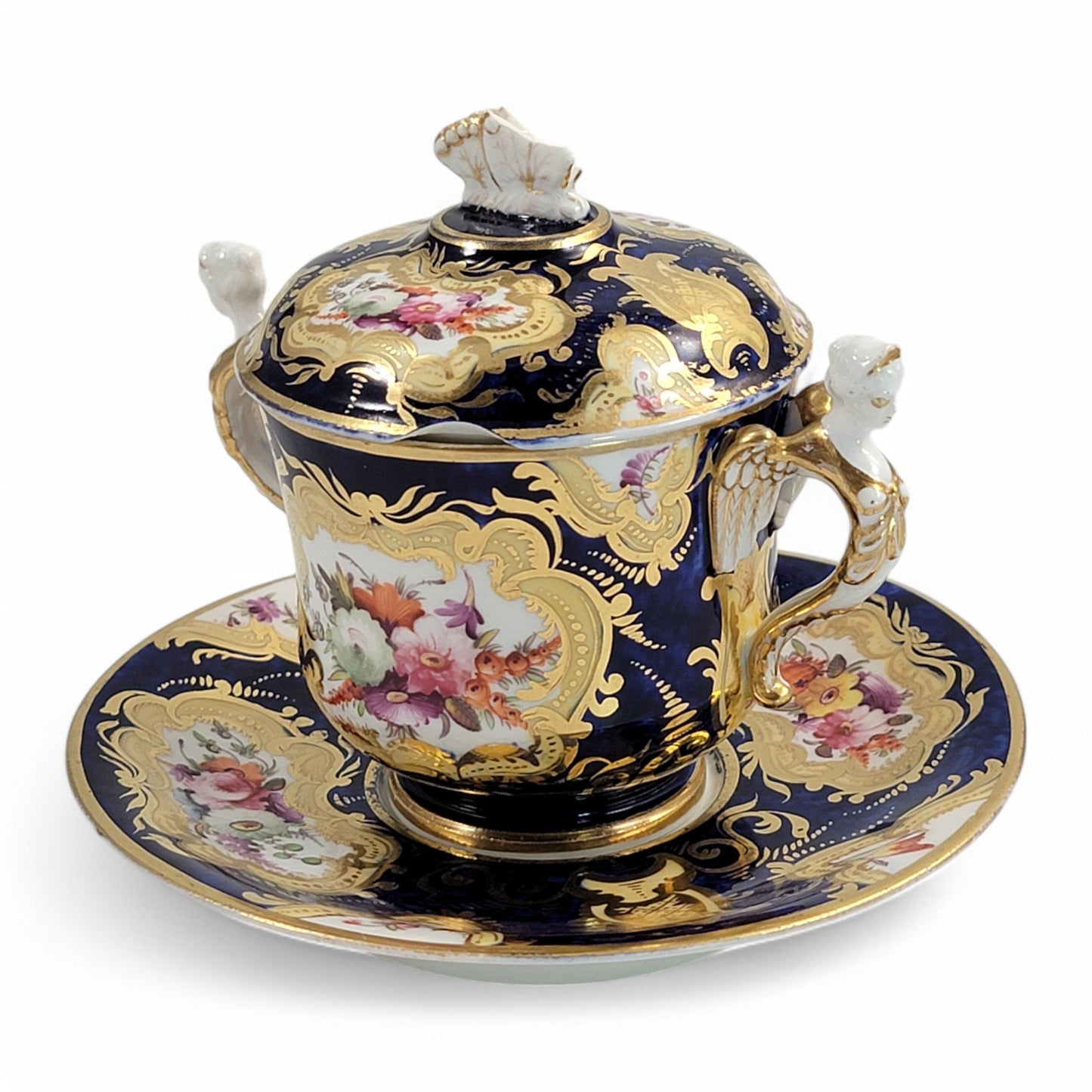 Regency era Coalport Pembroke chocolate cup and caucer, winged harpy handles