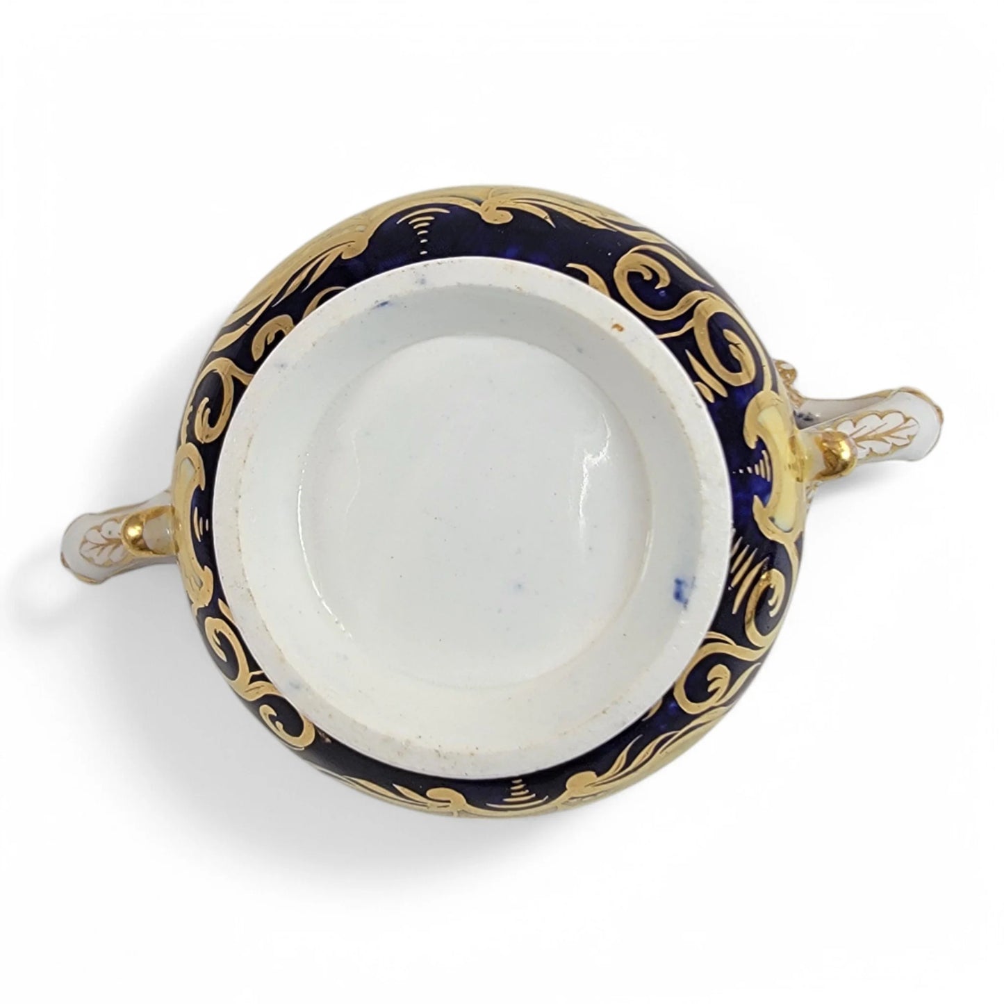 Regency era Coalport Pembroke chocolate cup and caucer, winged harpy handles