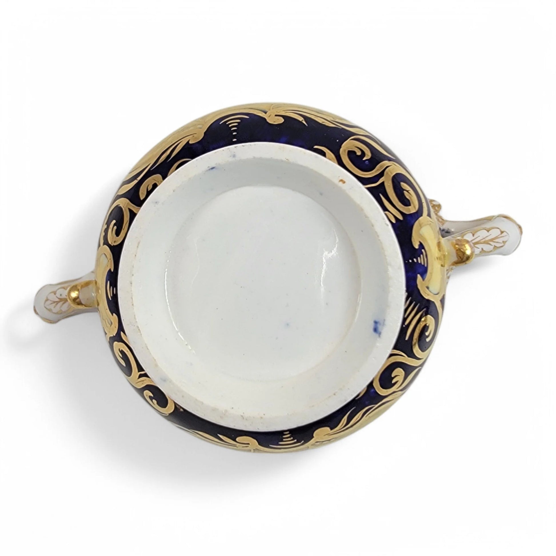 Regency era Coalport Pembroke chocolate cup and caucer, winged harpy handles