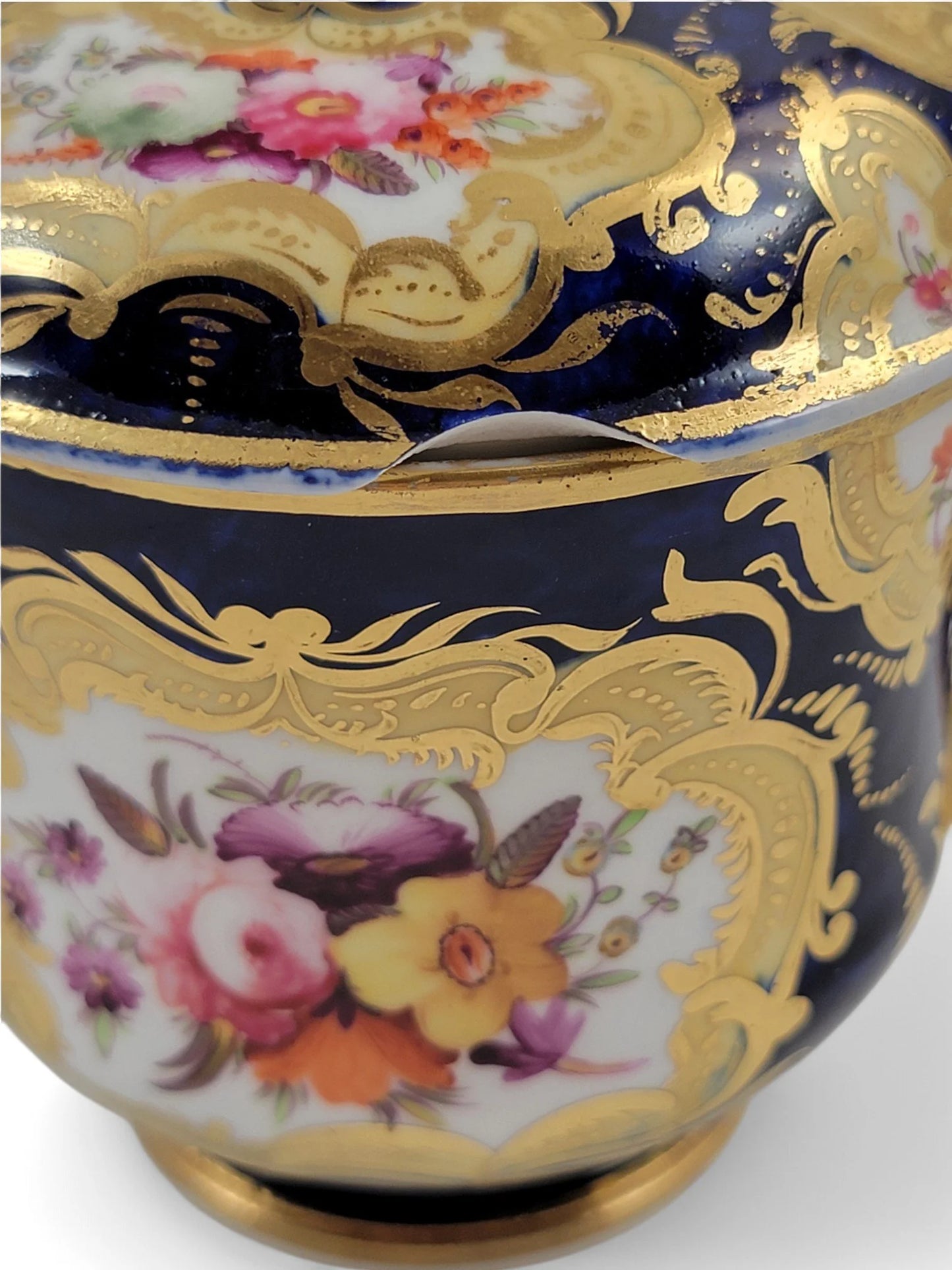 Regency era Coalport Pembroke chocolate cup and caucer, winged harpy handles
