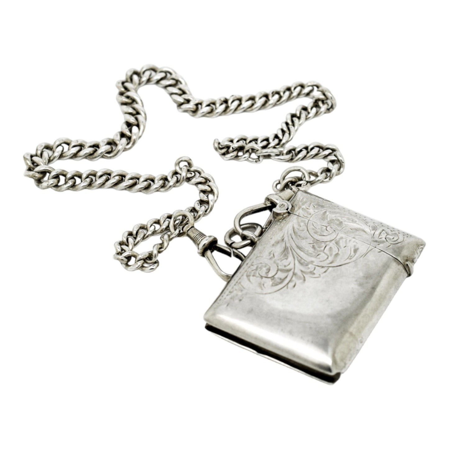 WWI sterling silver vesta case engraved with scrolls, on a Victorian watch curb Albert chain