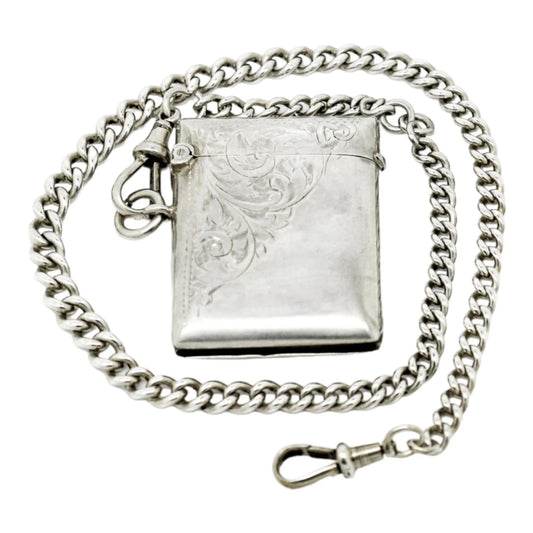 WWI sterling silver vesta case engraved with scrolls, on a Victorian watch curb Albert chain