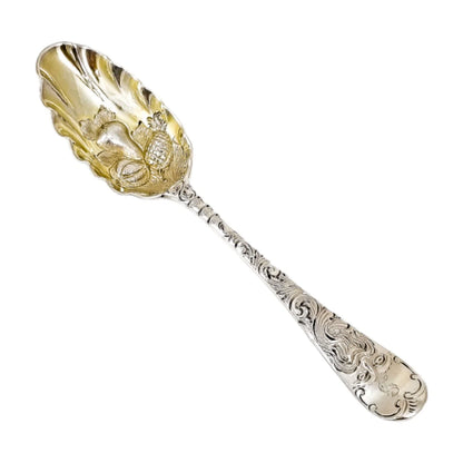George II silver gilt berry spoon with Green Man mask