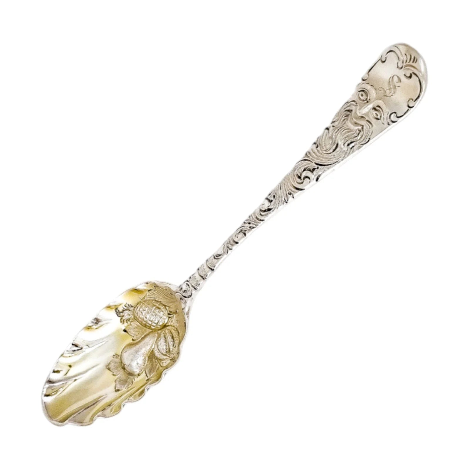 George II silver gilt berry spoon with Green Man mask