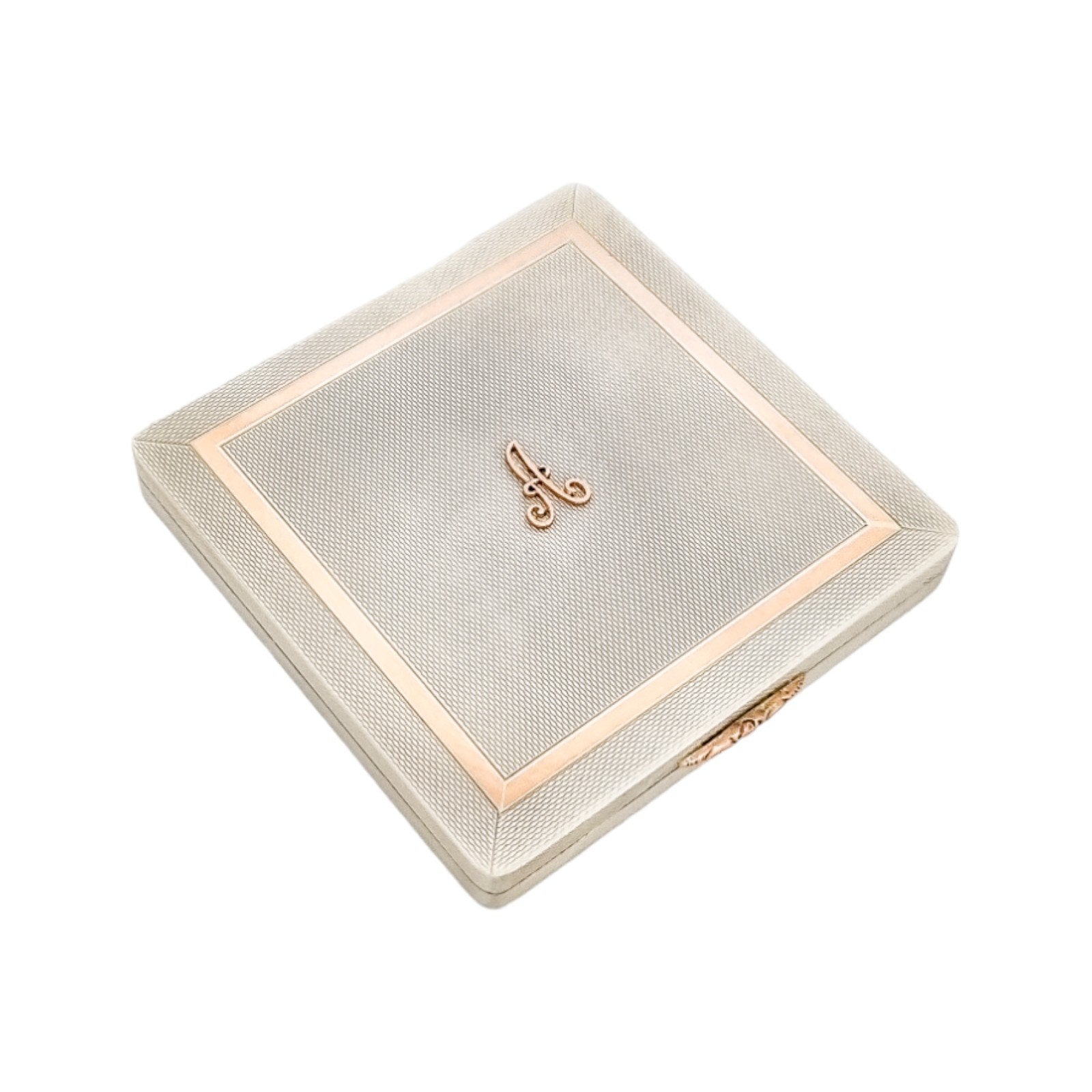 Silver matching cigarette case and powder compact with 9ct rose gold bands and letter "A"