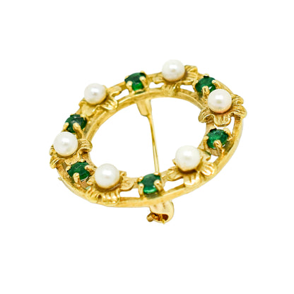 Vintage 9ct gold round openwork brooch / lace pin set with pearl flowers and emeralds