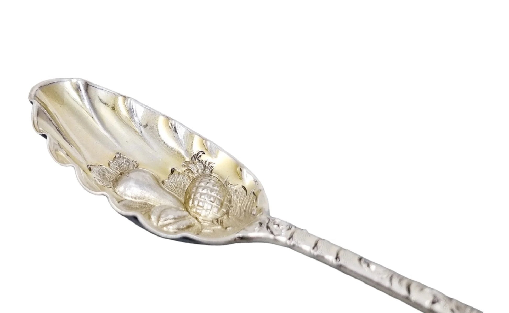 George II silver gilt berry spoon with Green Man mask