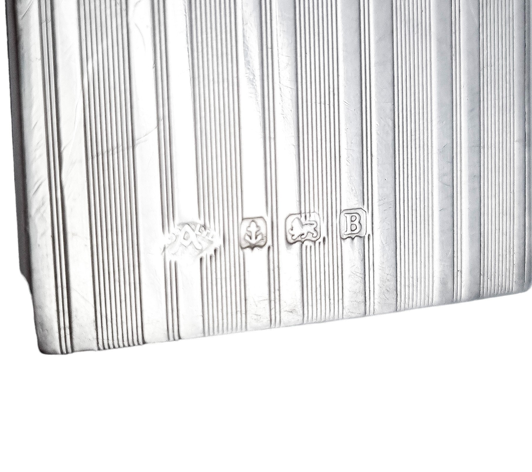 Art Deco sterling silver matchbox holder with vacant cartouche and banded design